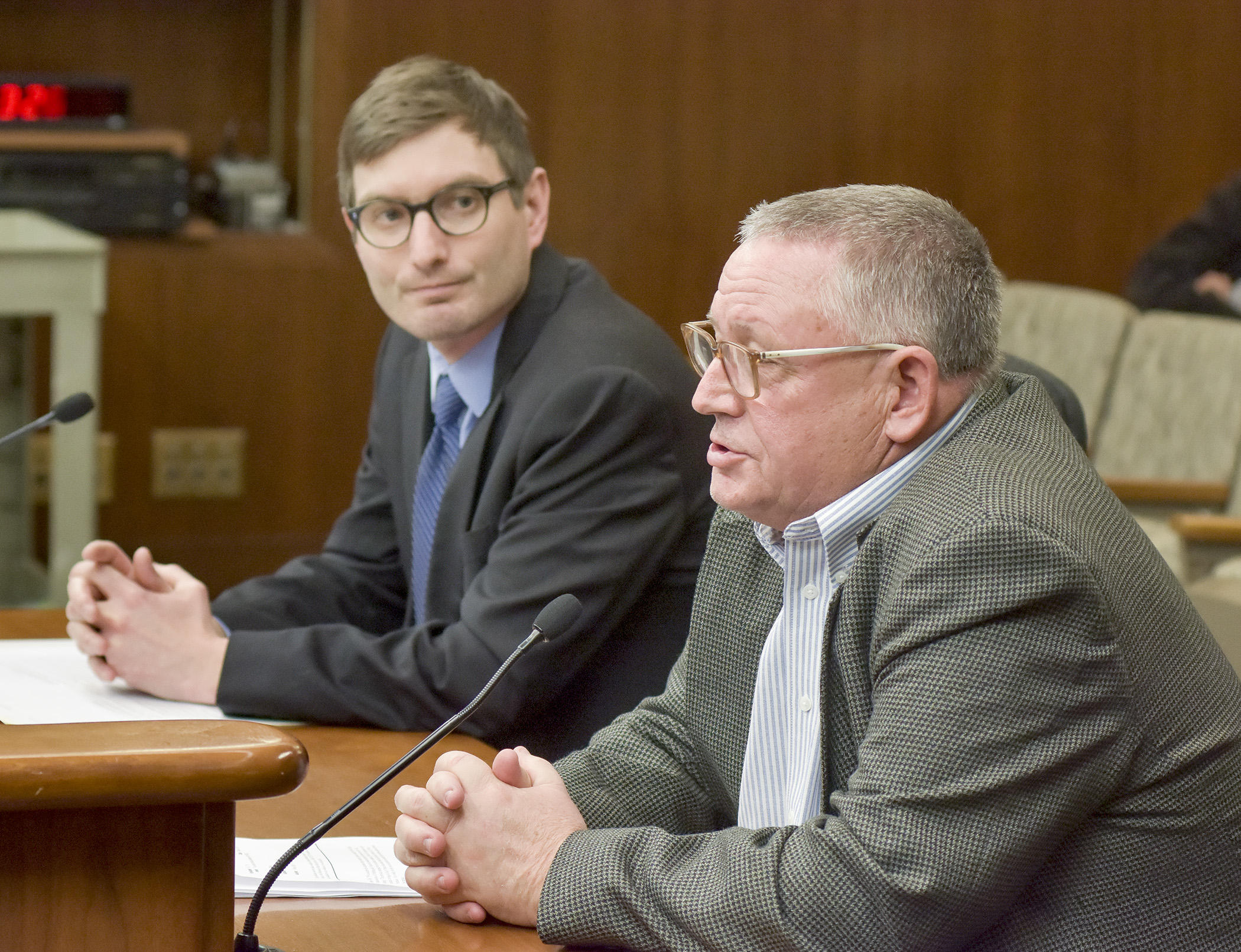 Terry Leoni, managing member of the Laurentian Energy Authority, testifies before the House Job Growth and Energy Affordability Policy and Finance Committee March 21 in support of a bill sponsored by Rep Jason Metsa, left, that would amend biomass project contract terms. Photo by Andrew VonBank